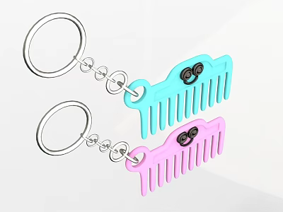 Cute Comb Shaped Keychains With Blue And Pink Colors And Black Eye Design 3d model
