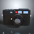 Black Leica Camera With Vintage Design Classic Lens And Red Logo