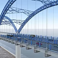 Blue Arch Bridge with Steel Structure and Vehicles Over Water Surface Supported by Piers