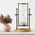 Decorative Ornament Combination With Hourglass Metal Frame Wooden Base And Pink Vase Pampas Grass
