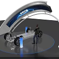 Car Chassis Display on Exhibition Stand with Person Observing and Blue Screen Background