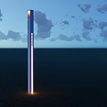 Tall Columnar Outdoor Light Glowing At Base In Open Ground Under Cloudy Night Sky