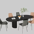 Modern Minimalist Dark Oval Dining Table Set With Stylish Upholstered Chairs And Exquisite Tabletop Decorations
