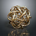 Shiny Golden Spherical Sculpture With Intertwined Metal Strips On Dark Background