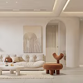 Modern Light Toned Living and Dining Room With Beige Sofa Heart Shaped Chair Archway And Wall Art