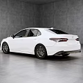 White Sedan Side View In Spacious Gray Background With Black Wheels And Sleek Body Lines
