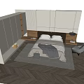 Modern Bedroom Interior With Cozy Bed White Pillows Gray Blanket Nightstands Table Lamp And Chair