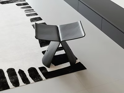 Modern Black Leather Stool On Black And White Patterned Rug In Interior 3d model