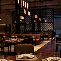 Modern Restaurant Interior With Chandeliers Dining Tables Warm Lighting And Decorative Walls