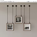 Wooden Frames With Black And White Photos Hanging On Gray Wall With Chains