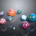 Colorful Spheres With Various Colors And Patterns On Black Background With Reflections