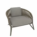 Modern Rattan Leisure Chair With Light Gray Cushion And Crossed Legs Design