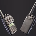Vintage Walkie Talkies With Antennas Display Screens And Control Buttons On Dark Surface