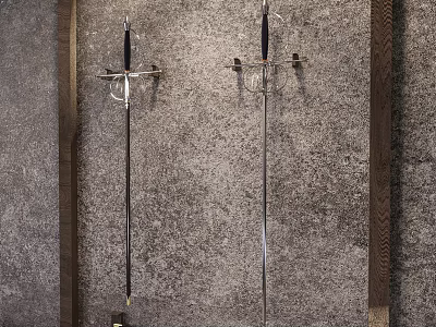 Two Antique Swords Mounted On Textured Wall 3d model
