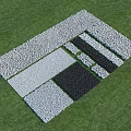 Geometric Pattern Ground Laid Out With Various Colored Stones On Green Grass