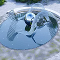 Modern Sculpture Featuring Metal Sphere And Curved Metal Strips In Water With Trees And Lighting