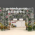 Elure Greenhouse Membership Experience Center with Floral Archway and Reception Desk