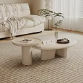 Modern Coffee Table Design in Living Room With Light Colored Surface Magazines Tray and Plants