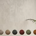 Textured Beige Wall with Various Color Swatches and Green Plant Foliage