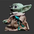 Baby Yoda Toy With Green Skin Brown Robe White Scarf And Green Creature