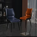 Modern Blue And Orange Dining Chairs With Upholstered Seats And Black Legs Design
