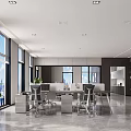 Modern Open Bright Public Office Area With Large Windows Green Plants Desks Office Chairs Bookshelves
