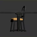 Simple two dining tables with yellow tabletops and chair with yellow cushion on grey background