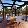 Modern Glass Roof Pergola with Surrounding Flowers Trees and Outdoor Relaxation Area