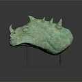 Detailed Green Dragon Head Sculpture With Textured Surface On Gray Stand