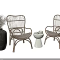Rattan Table and Chair Set with Armrests Small Round Table Ceramic Vase and Dried Flowers