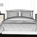 Modern Cozy Double Bed With Gray Upholstered Headboard Beige Pillows And Bedside Tables