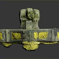 Decorative Metallic Household Item With Green Accents And Yellow Decorative Blocks