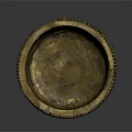 Carved Brass Bowl With Intricate Decorative Rim And Detailed Interior Patterns