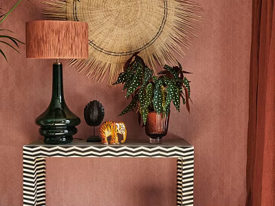 Stylish Console Table With Potted Plant Table Lamp And Woven Decor On Striped Top 3d model
