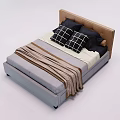 Double Bed With Brown Upholstered Headboard Black Checkered Pillows And Gray Striped Blanket