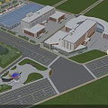 Aerial View Of Large Industrial Factory Complex With Multiple Buildings And Greenery