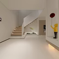 Modern Basement Living Space With Leather Chair Coffee Table Green Plant And TV Wall