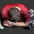 Man In Red T-Shirt Arms Crossed Holding Plaid Shirt Blue Jeans White Shoes Grey Background
