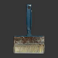 Vintage Paintbrush With Blue Handle And Brown Bristles On Reflective Surface