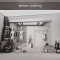 Fashion Clothing Store Window Display With Mannequins Hanging Clothes And Decorative Rocks
