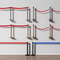 Different Colored Stanchion Ropes With Black Gold Posts On Wall And Floor