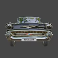 Black Vintage Classic Car With Chrome Grille Headlights And White Wall Tires