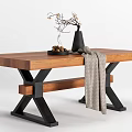 Rustic Wooden Dining Table With Black Metal Legs Gray Knitted Throw And Twig Decor