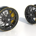 Sleek Black Alloy Car Wheels With Yellow Rim Accent And Silver Spokes