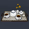 Wine Bottle And Glasses On Gold Trimmed Tray With Dark Blue Tablecloth And Red Roses