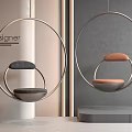 Modern Hanging Chair with Round Metal Frame and Gray Brown Cushions in Interior Space