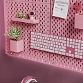 Pink Themed Computer Desktop Setup With Perforated Boards Headphones And Decorations 3d model