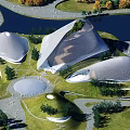 Modern Cultural Center Building with Unique Curved Roofs Surrounded by Water Green Lawns and Trees