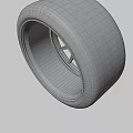 Car Tire With Modern Alloy Wheel Rim Black Spoke Design And Branded Sidewall