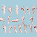 Woman's Hands Displaying Various Gestures And Poses On Blue Backdrop